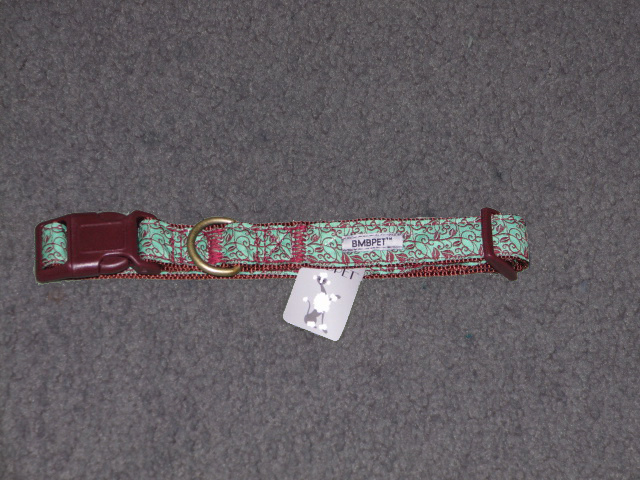 Mint green collar with chocolate brown vine pattern.
